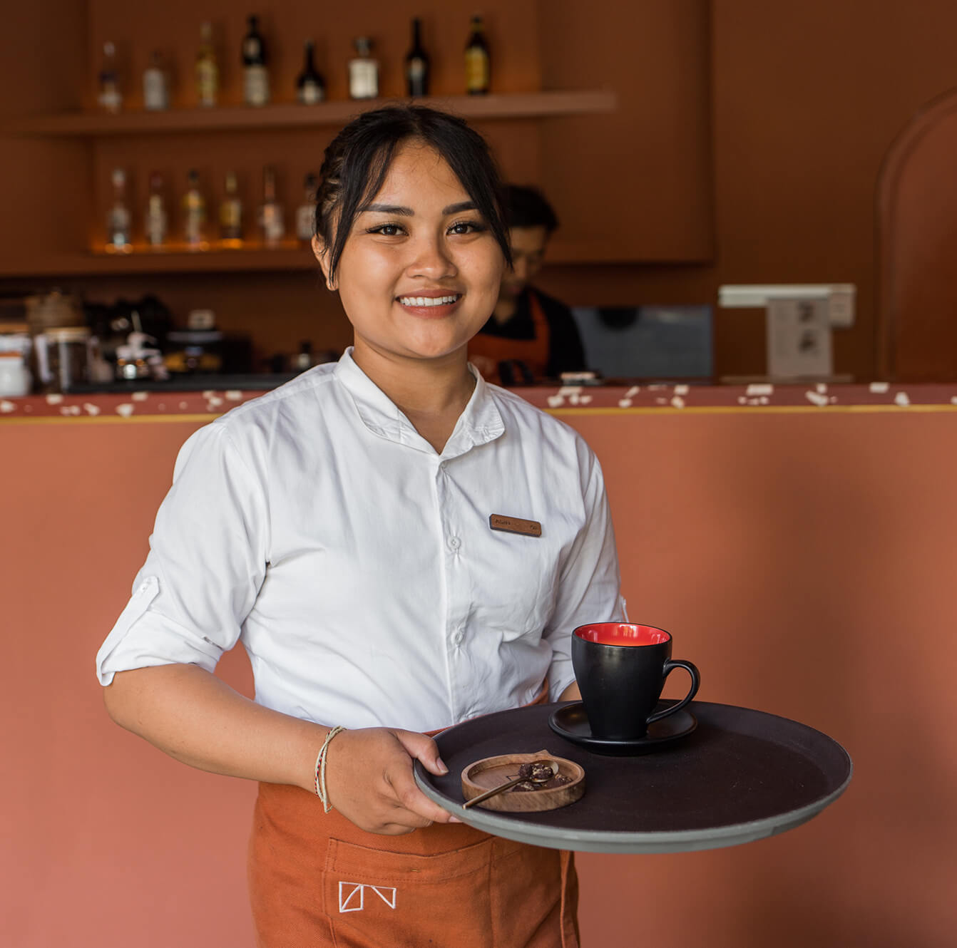 ASAI Cafe staff uniform with Christmas palette